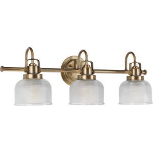 Progress Lighting - P2992-163 - Three Light Bath Bracket - Archie - Vintage Brass