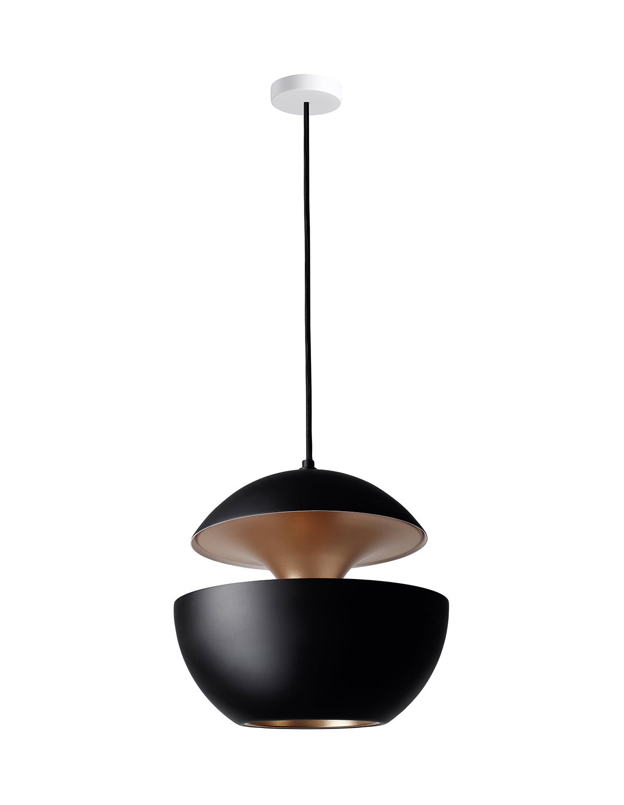 Aluminium pendant lamp. Inspired by the setting sun, it can be arranged alone or in a cluster and is available in several sizes an