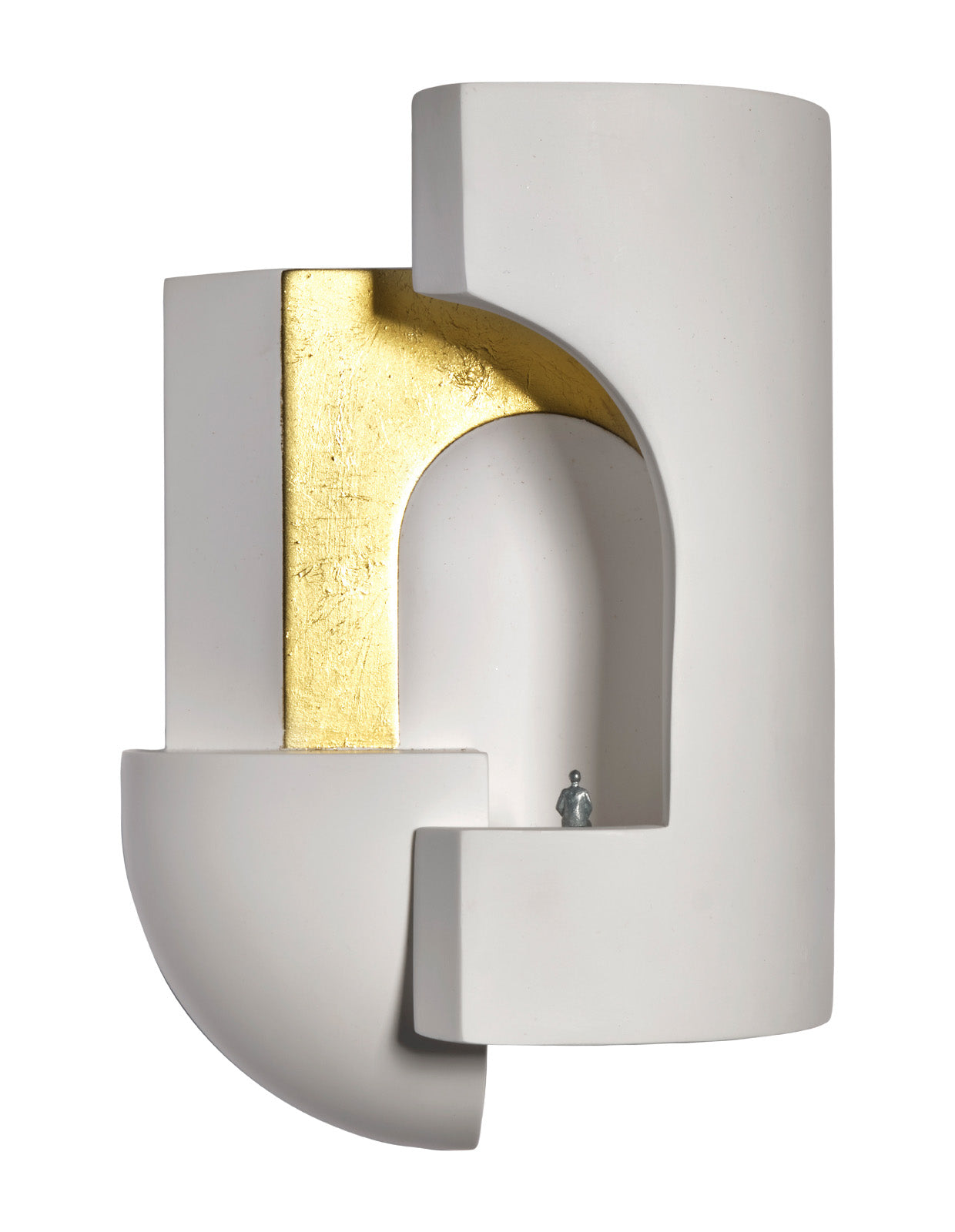 White plaster wall lamp with gold leaf decoration, equipped with an integrated LED source.
Charles Kalpakian was born in Beirut, L