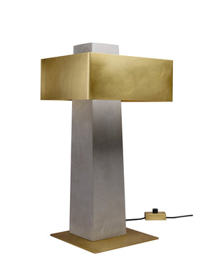 Table lamp in concrete and steel. Iota, a lamp that borrows its name and shape from the Greek alphabet. A return to the essentials