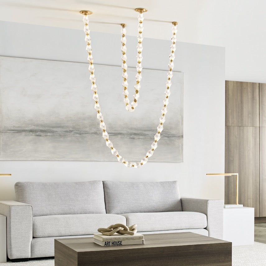 LED Chandelier from the Collier collection in Natural Brass finish