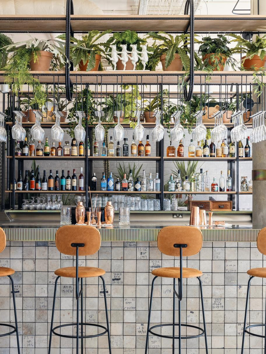 Audo Copenhagen counter chairs in a high end bar