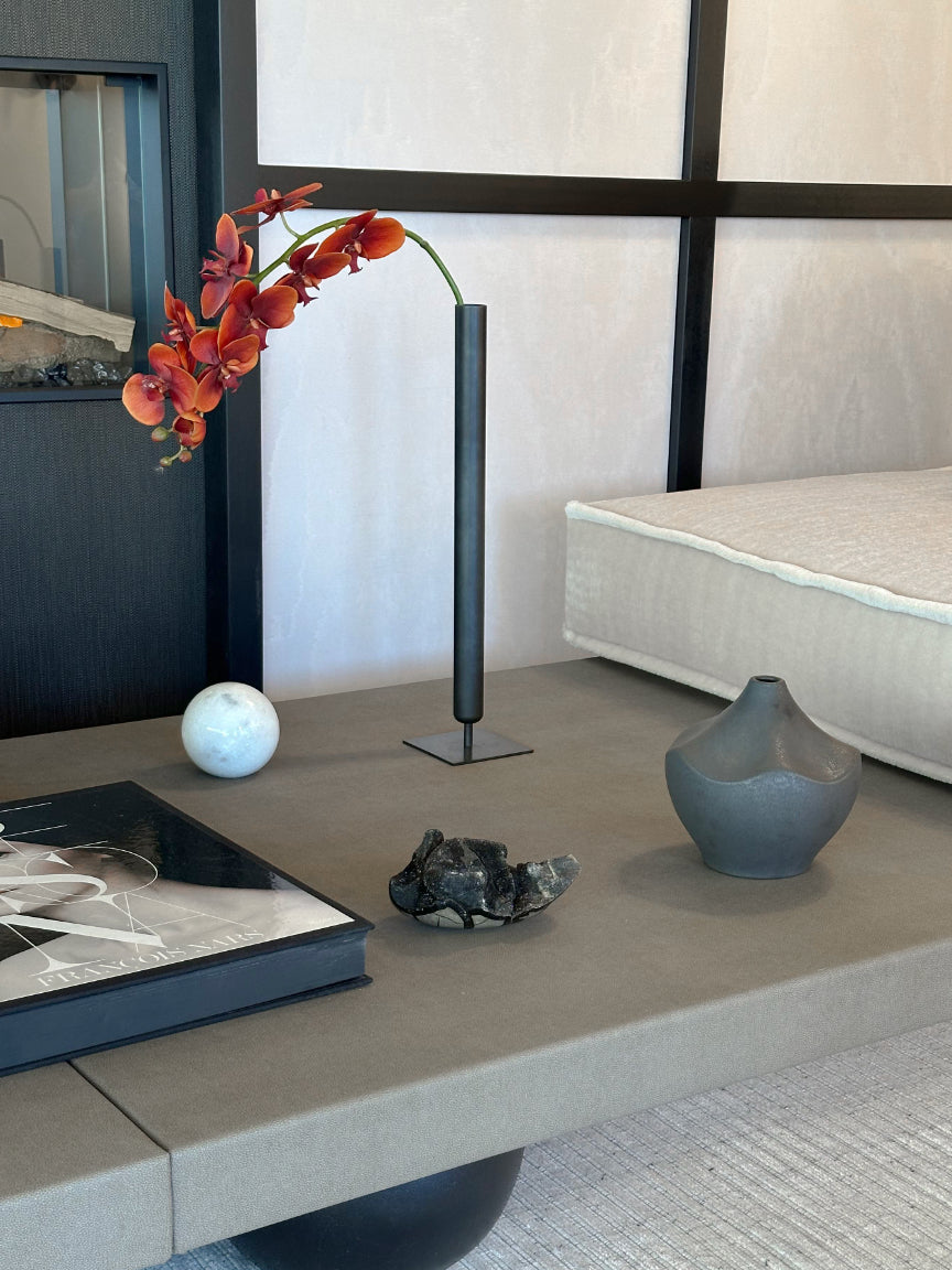 Modern living room with decorative items on a coffee table