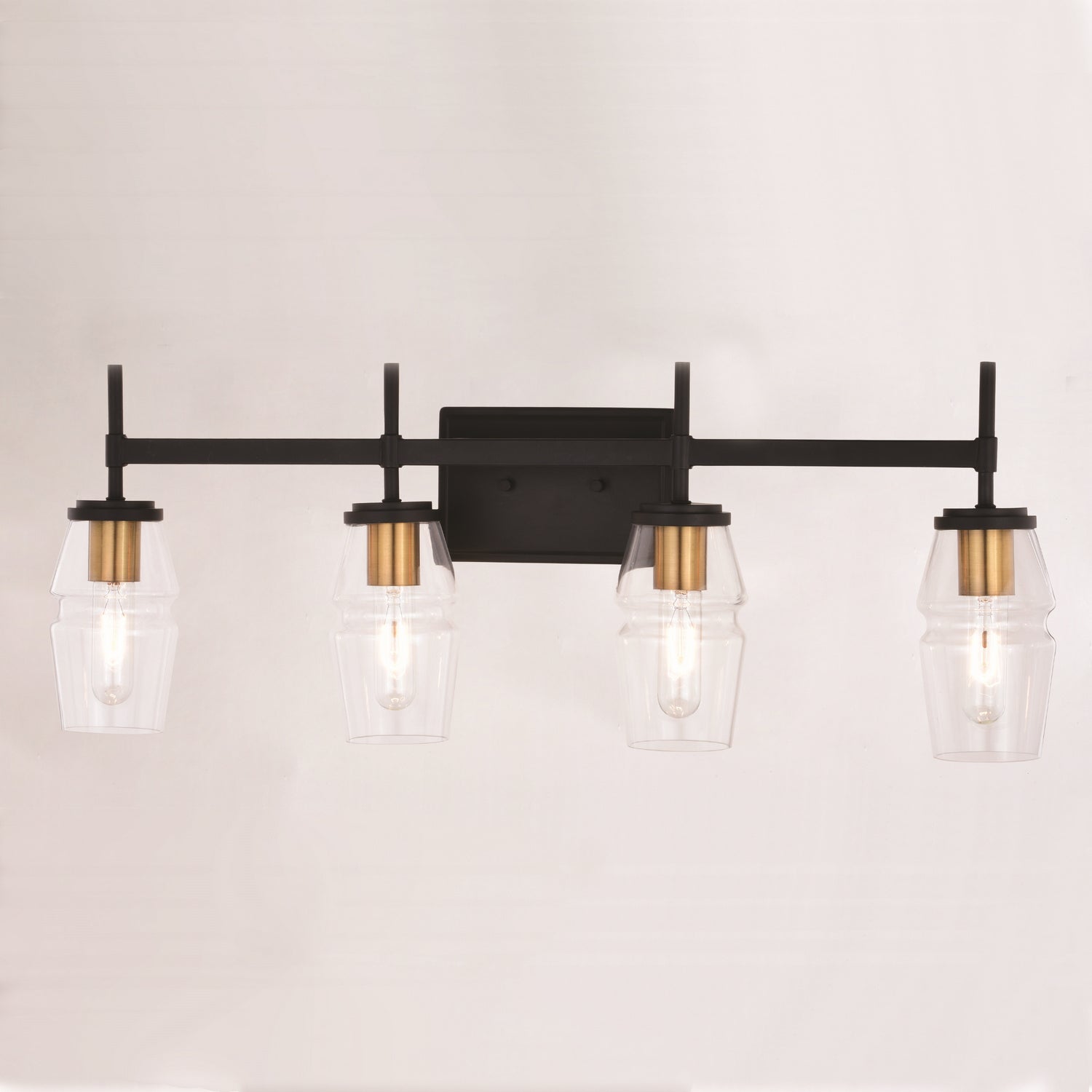 Vaxcel - W0394 - Four Light Vanity - Warren - Matte Black and Brushed Brass