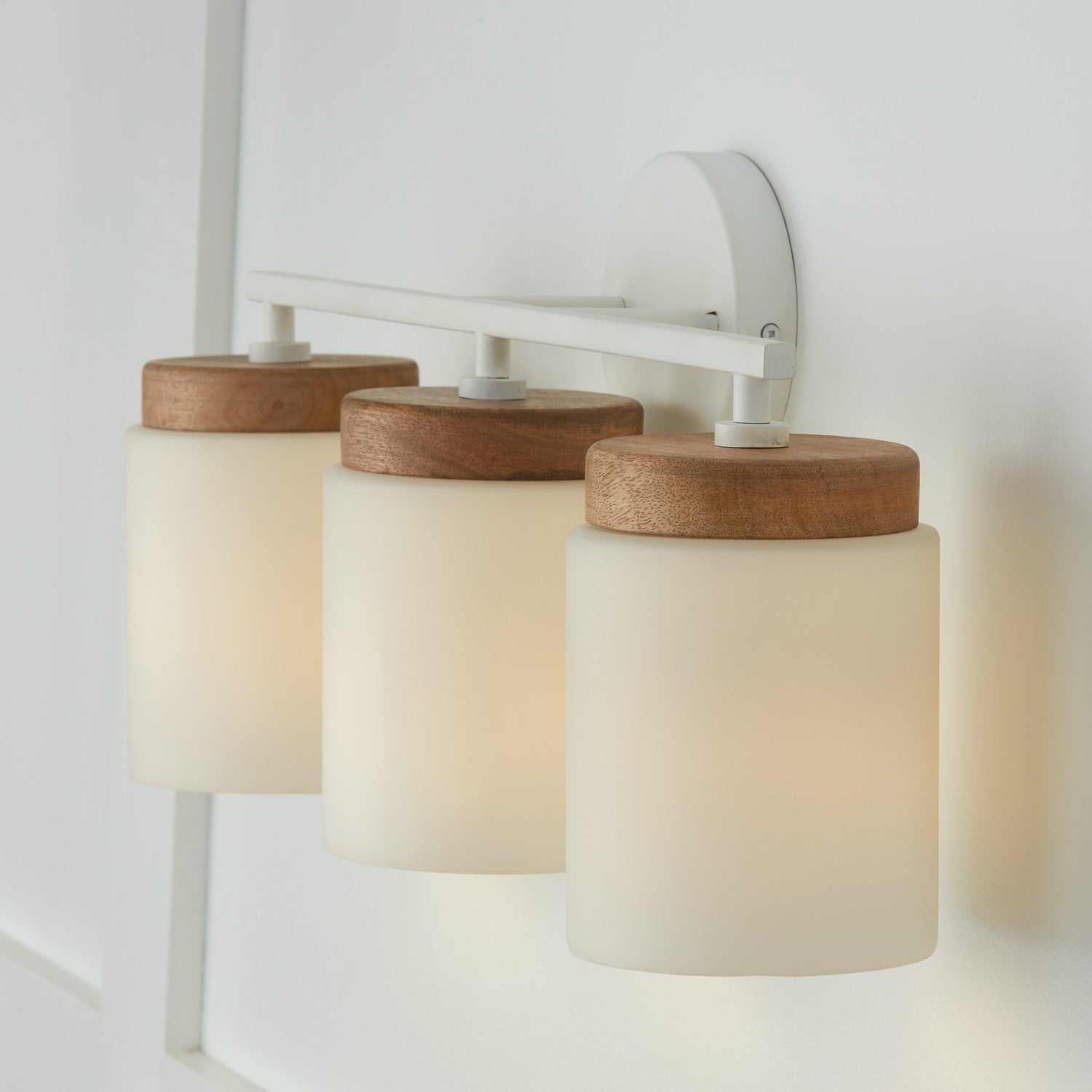 Capital Lighting - 150931LT-547 - Three Light Vanity - Liam - Light Wood and White